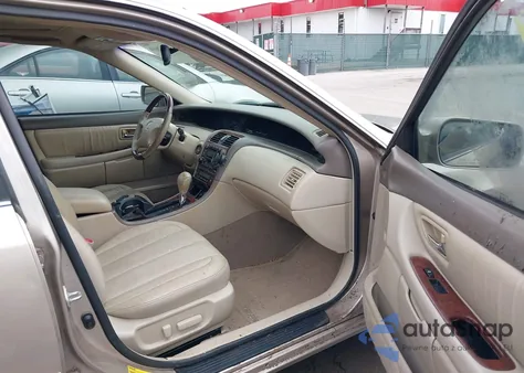 2003 Toyota Avalon Xls z USA, uszkodzony, nr VIN 4T1BF28B83U304145